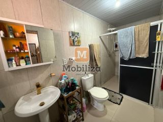Casa no bairro Flodoaldo Pontes Pinto com terreno de 250m²