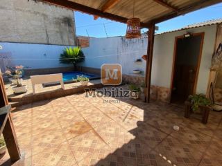 Casa no bairro Aponiã com piscina e terreno de 250m²