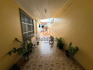 Casa com 5 dormitórios sendo 1 suíte e piscina no bairro Aponiã 180m²