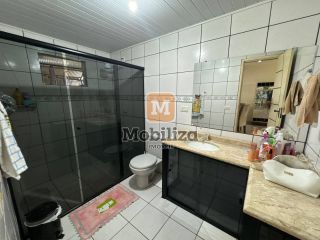 Casa com 5 dormitórios sendo 1 suíte e piscina no bairro Aponiã 180m²