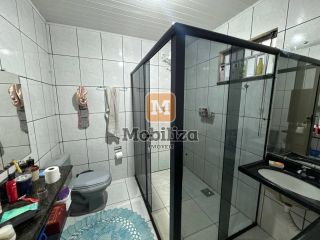 Casa com 5 dormitórios sendo 1 suíte e piscina no bairro Aponiã 180m²