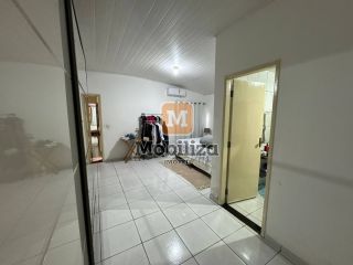 Casa com 5 dormitórios sendo 1 suíte e piscina no bairro Aponiã 180m²