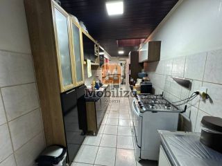 Casa com 3 dormitórios sendo 1 suíte e piscina no bairro Aponiã