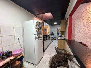 Casa com 3 dormitórios sendo 1 suíte e piscina no bairro Aponiã