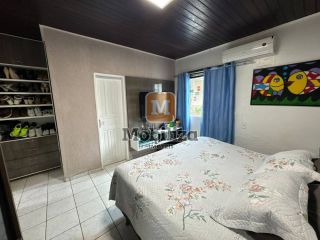 Casa com 3 dormitórios sendo 1 suíte e piscina no bairro Aponiã