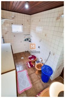 Casa no bairro Cuniã com 3 dormitórios sendo 1 suíte e 240m² de área construída