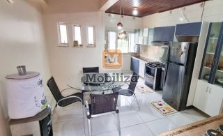 Casa no bairro Cuniã com 3 dormitórios sendo 1 suíte e 240m² de área construída