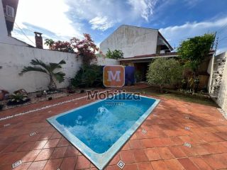 Sobrado com 3 dormitórios e uma ampla área externa com piscina e ambiente arborizado - bairro Rio Madeira