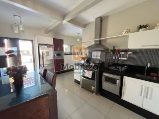 Casa com 3 dormitórios sendo 1 suíte e edícula contendo depósito e banheiro no Condomínio San Matheus