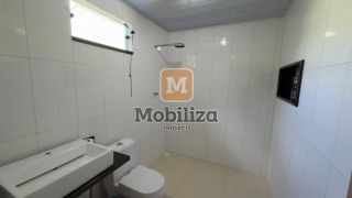 Casa com 3 dormitórios e piscina no bairro Flodoaldo Pontes Pinto