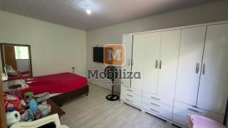 Casa com 3 dormitórios e piscina no bairro Flodoaldo Pontes Pinto