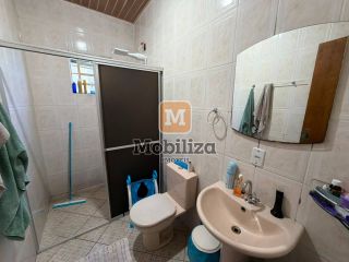 Casa ampla com 3 quartos sendo 1 suíte e terreno de 900m² no bairro Igarapé