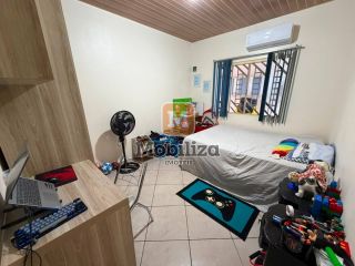 Casa ampla com 3 quartos sendo 1 suíte e terreno de 900m² no bairro Igarapé