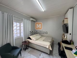 Casa com 5 dormitórios sendo 2 suítes, piscina e cômodos amplos no bairro Flodoaldo Pontes Pinto