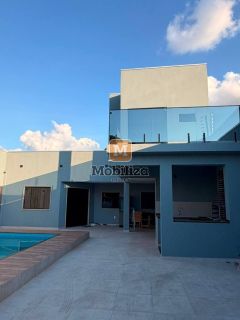 Sobrado sofisticado com 3 suítes, piscina, energia solar e ponto para carro elétrico no bairro Aponiã