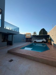 Sobrado sofisticado com 3 suítes, piscina, energia solar e ponto para carro elétrico no bairro Aponiã