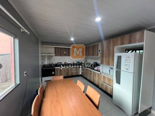 Casa com 3 quartos sendo 1 suíte, quintal amplo e ótima localização no bairro Aponiã