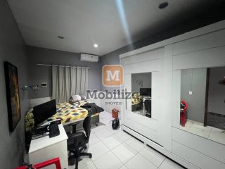 Casa com 3 quartos sendo 1 suíte, quintal amplo e ótima localização no bairro Aponiã