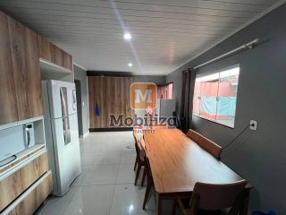 Casa com 3 quartos sendo 1 suíte, quintal amplo e ótima localização no bairro Aponiã