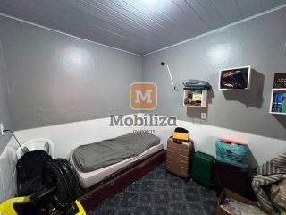 Casa com 3 quartos sendo 1 suíte, quintal amplo e ótima localização no bairro Aponiã