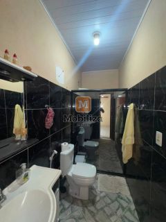 Casa com 4 dormitórios sendo 1 suíte e piscina privativa no bairro Flodoaldo Pontes Pinto