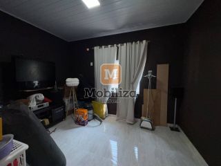 Casa com 4 dormitórios sendo 1 suíte e piscina privativa no bairro Flodoaldo Pontes Pinto
