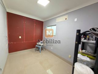 Casa com 4 suítes, ambientes espaçosos, área gourmet e piscina no Condomínio Bougainville