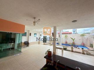 Casa com 4 suítes, ambientes espaçosos, área gourmet e piscina no Condomínio Bougainville