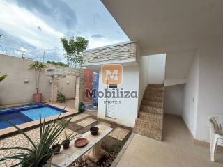 Casa com 4 suítes, ambientes espaçosos, área gourmet e piscina no Condomínio Bougainville