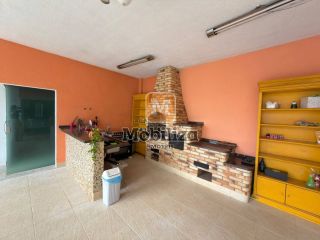 Casa com 4 suítes, ambientes espaçosos, área gourmet e piscina no Condomínio Bougainville
