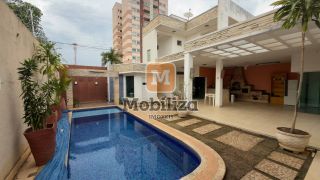Casa com 4 suítes, ambientes espaçosos, área gourmet e piscina no Condomínio Bougainville