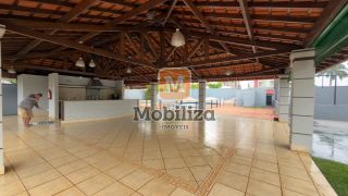 Casa com 4 suítes, ambientes espaçosos, área gourmet e piscina no Condomínio Bougainville