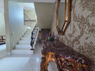 Alugo casa no Condomínio Golden Green de 600m² - 6 suítes - Olho D´agua mobiliada