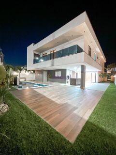 Casa duplex no Condomínio Alphaville de 514m² com 5 suítes