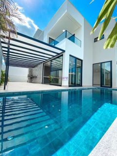 Casa duplex de 398m² com 5 suítes + espaço gourmet no Condomínio Alphaville