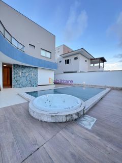 Casa duplex de 340m² com 5 suítes + espaço gourmet com piscina no Alphaville Araçagy