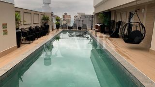 Apartamento Finamente Mobiliado e Decorado, sendo 2 suítes e 2 vagas de Garagem em Itapema