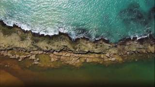 Terreno pé na areia em sonho verde