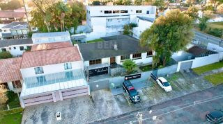 Casa Versátil no Boa Vista: Excelente para Comércio ou Residência com Amplo Terreno e ZR3!