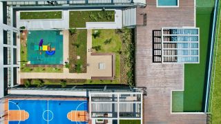 Apartamento de luxo à venda no Upside Home Club, Piçarras. 4 Quartos, vista deslumbrante do mar (11º andar) e 2 vagas. Condomínio pé na areia com lazer completo.