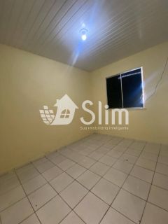Casa em rua Pública no bairro Aruana