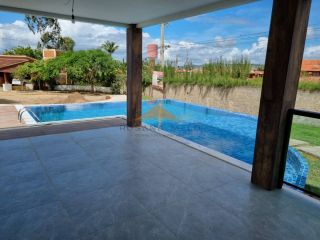 Casa espetacular no condomínio Raízes da Serra II,500M,5 suítes, espaço gourmet, piscina privativa