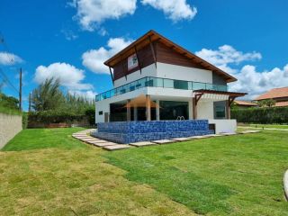 Casa espetacular no condomínio Raízes da Serra II,500M,5 suítes, espaço gourmet, piscina privativa