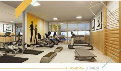 Apartamento à venda no Edifício Easy Barra, 58,83m², 2 quartos, 1 suíte, varanda, área de serviço, 1 vaga de garagem.