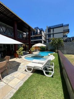 Casa em condomínio fechado em Muro Alto, 485m², 4 suítes, varanda, lavabo, cozinha integrada, piscina, 4 vagas de garagem