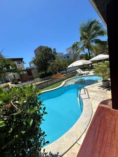 Casa em condomínio fechado em Muro Alto, 485m², 4 suítes, varanda, lavabo, cozinha integrada, piscina, 4 vagas de garagem