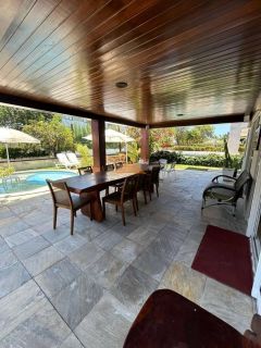 Casa em condomínio fechado em Muro Alto, 485m², 4 suítes, varanda, lavabo, cozinha integrada, piscina, 4 vagas de garagem