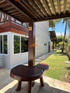 Casa em condomínio fechado em Muro Alto, 485m², 4 suítes, varanda, lavabo, cozinha integrada, piscina, 4 vagas de garagem