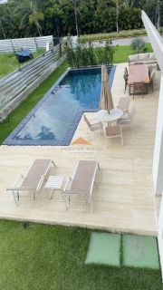 Belíssima casa em Aldeias com 370m², 4 suítes, piscina privativa, espaço gourmet com churrasqueira e lavabo, 4 vagas de garagem