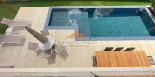 Belíssima casa em Aldeias com 370m², 4 suítes, piscina privativa, espaço gourmet com churrasqueira e lavabo, 4 vagas de garagem
